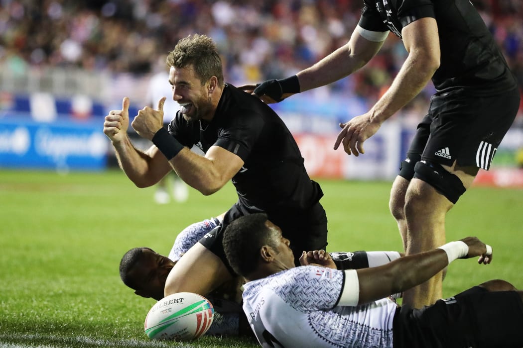 Kurt Baker celebrates the winning try against Fiji.