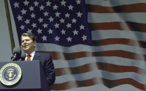 United States President Ronald Reagan, as he addresses citizens in July 1987.