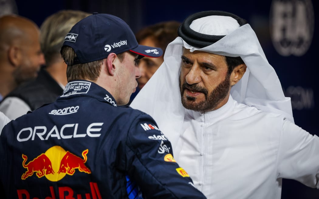 President of the FIA Mohammed Ben Sulayem chats with Red Bull driver Max Verstappen during the Formula 1 Saudi Arabian Grand Prix, 2024.