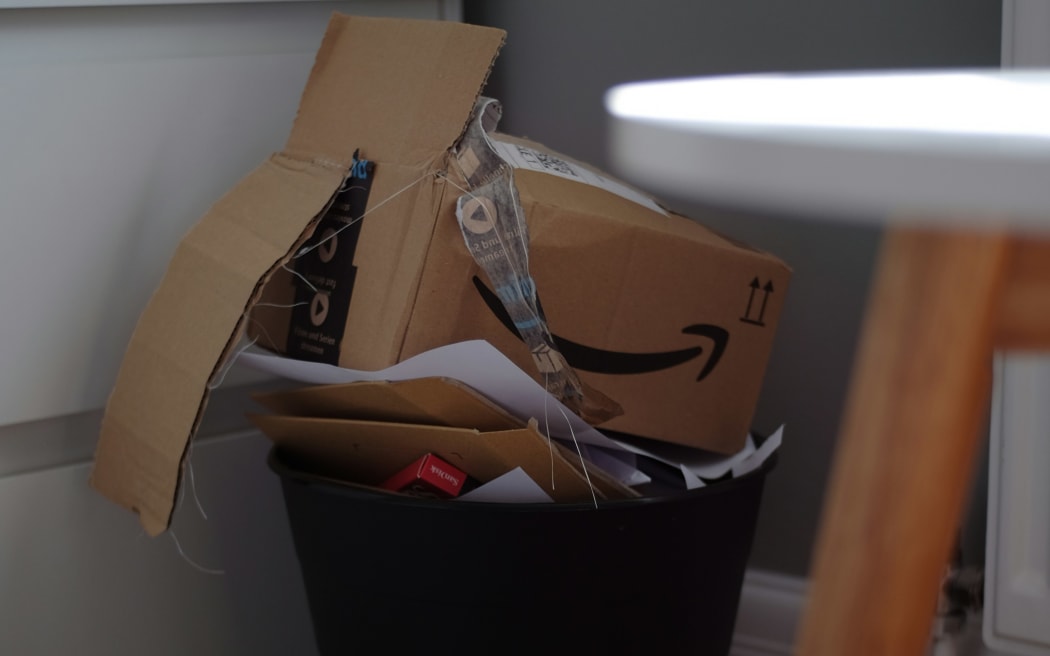An Amazon box in the bin.