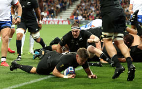 Cam Roigard scores his second try during the France 2023 Rugby World Cup Pool A match between New Zealand and Namibia.