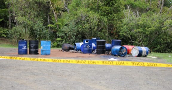 Oil barrels left at another car park.