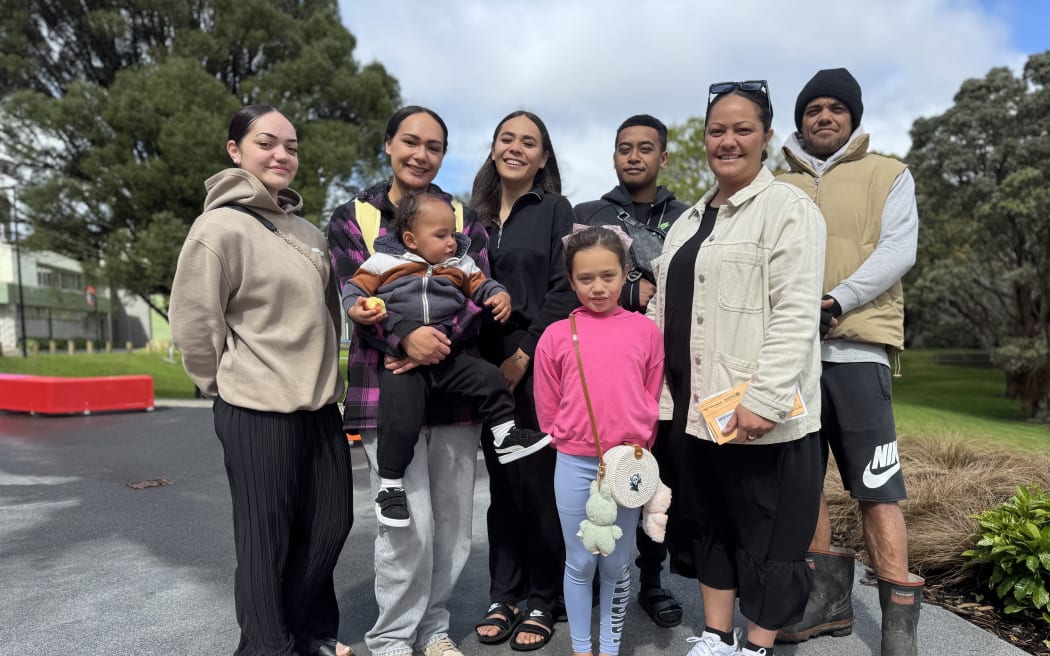 Whānau group leader Lizzie Ranui (front right in khaki jacket) with the group of four first-time mostly teenage voters who are now voting in the local elections thanks to her efforts. From left Lizzie-Jean Ranui, Rangimarie Harding holding son Morehu Harding, Isabel Chapman, Huia Ranui, Juztyze Ranui - and brother Kyle Chapman in his thirties who she brought to vote for the first time in more than a decade
