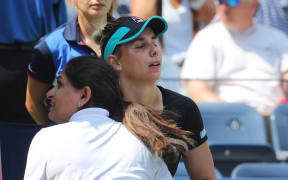 Marina Erakovic receives treatment for a knee injury. US Open 2015.