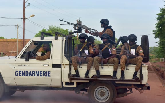 A picture take on 30 October 2018 shows Burkinabe gendarmes sitting on their vehicle in the city of Ouhigouya in the north of the country.