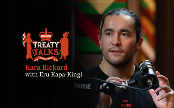 Crest referencing the nz coat of arms but featuring silhouette of a woman holding tino rangatiratanga flag and a crown with māori designs and the word Aotearoa at the base.
Colours are mainly red with some cream, all on a black background.
Text reads Kara Rickard with Eru Kapa-Kingi.
Image of guest in conversation with host Kara (who is out of shot)
