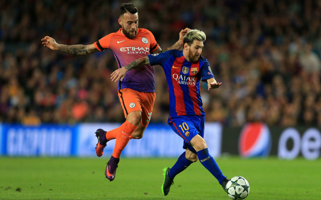 FC Barcelona v Manchester City - Lionel Messi of Barcelona gets away from Nicolas Otamendi of Man City