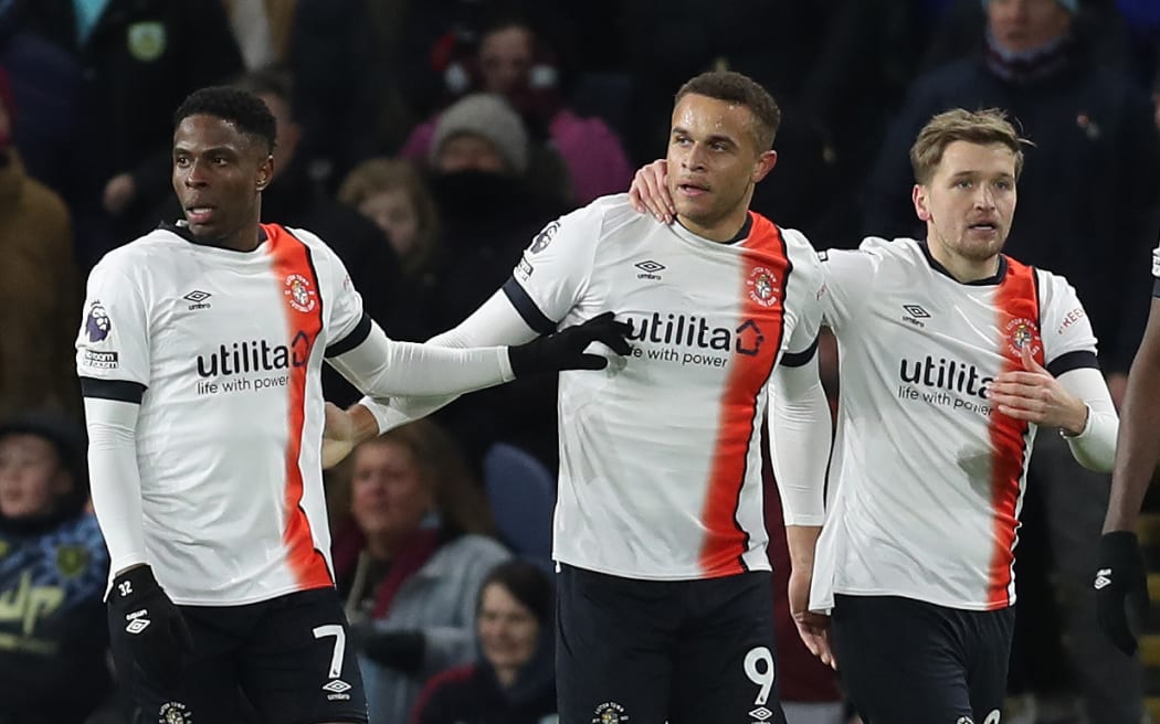 Luton Town players celebrate a goal.