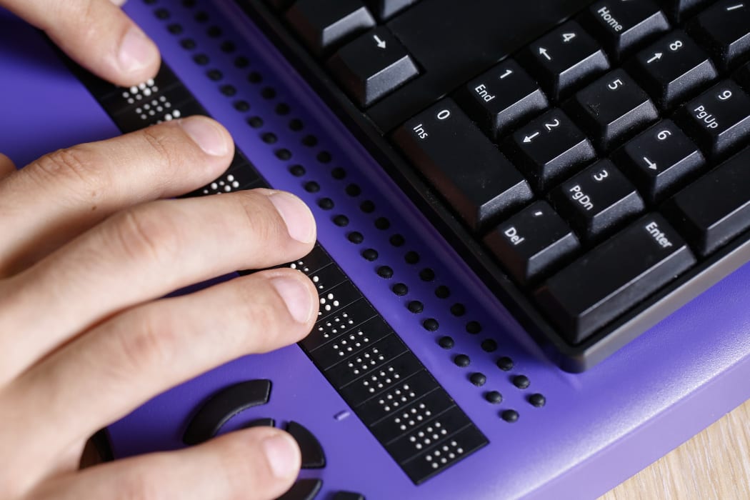 A keyboard with braille.