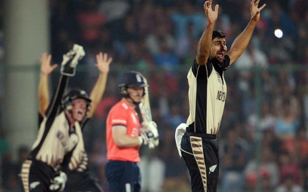 Ish Sodhi appeals successfully for the wicket of England captain Eoin Morgan.