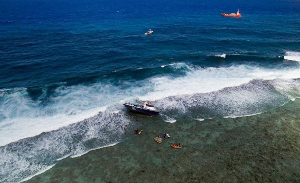 Dramatic salvage efforts being made to remove the FV Zambucca off the reef on the south-eastern side of Rarotonga