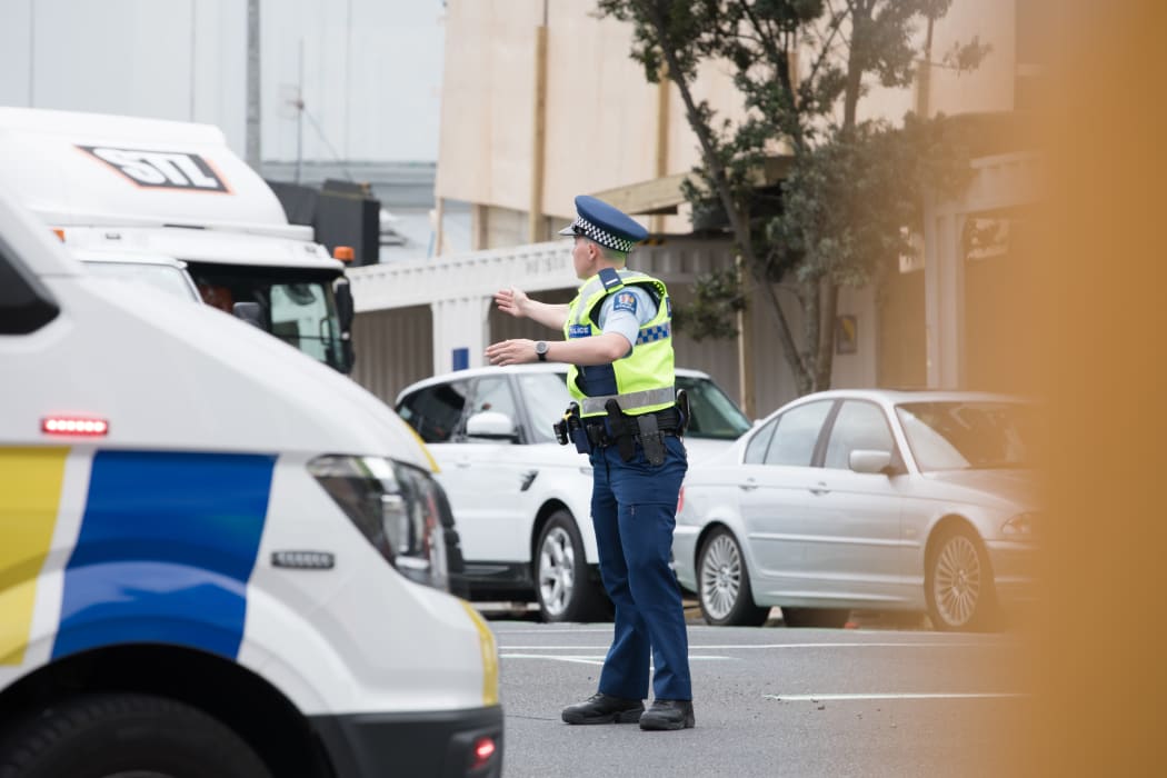 Police direct traffic on road diversions after a fire broke out at the SkyCity convention centre.