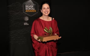 Victoria Kelly poses with her award at the Silver Scrolls Photo RNZ Diego Opatowski