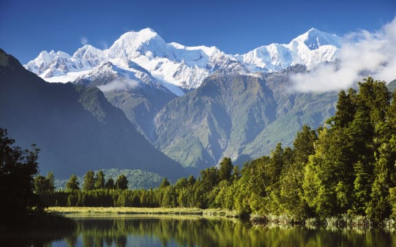 Lake Matheson, Mount Tasman and Mount Cook seen from Westland Tai Poutini National Park.