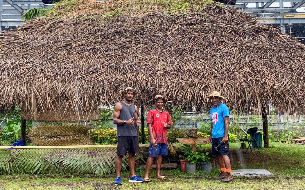 From left to right: Jope Ubitau, Steven Ledua and Biu Veigaravi stand before the build shed structure measuring 36 x 10 metres.