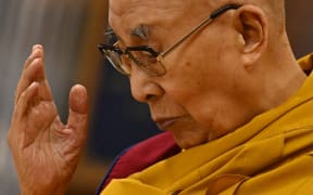 Tibetan spiritual leader Dalai Lama attends a long life prayer offered to him by his students and devotees at his temple in McLeod Ganj, some 10 Km from Dharamsala on October 25, 2023. (Photo by Money SHARMA / AFP)