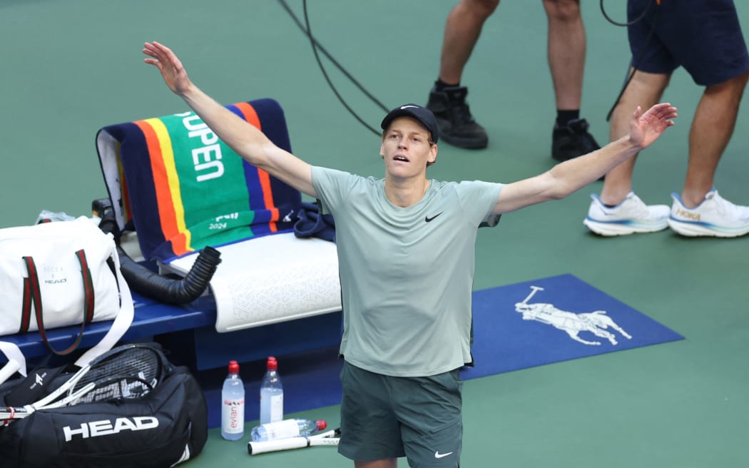 Italy's Jannik Sinner reacts after winning his men's final match against USA's Taylor Fritz on day fourteen of the US Open tennis tournament at the USTA Billie Jean King National Tennis Center in New York City, on September 8, 2024. (Photo by CHARLY TRIBALLEAU / AFP)