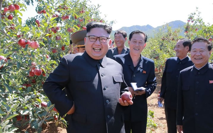 An undated picture released from North Korea's official Korean Central News Agency (KCNA) on September 21 shows North Korean leader Kim Jong-Un visiting a fruit farm at Kwail-ŭp County.
