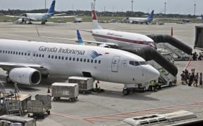 Garuda Indonesia planes at the Soekarno-Hatta International Airport.