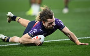 Ryan Papenhuyzen of the Storm scores a try during the NRL Preliminary Final match between the Melbourne Storm and the Sydney Roosters at AAMI Park Friday, September 27, 2024.  (AAP Image/Joel Carrett/Photosport)