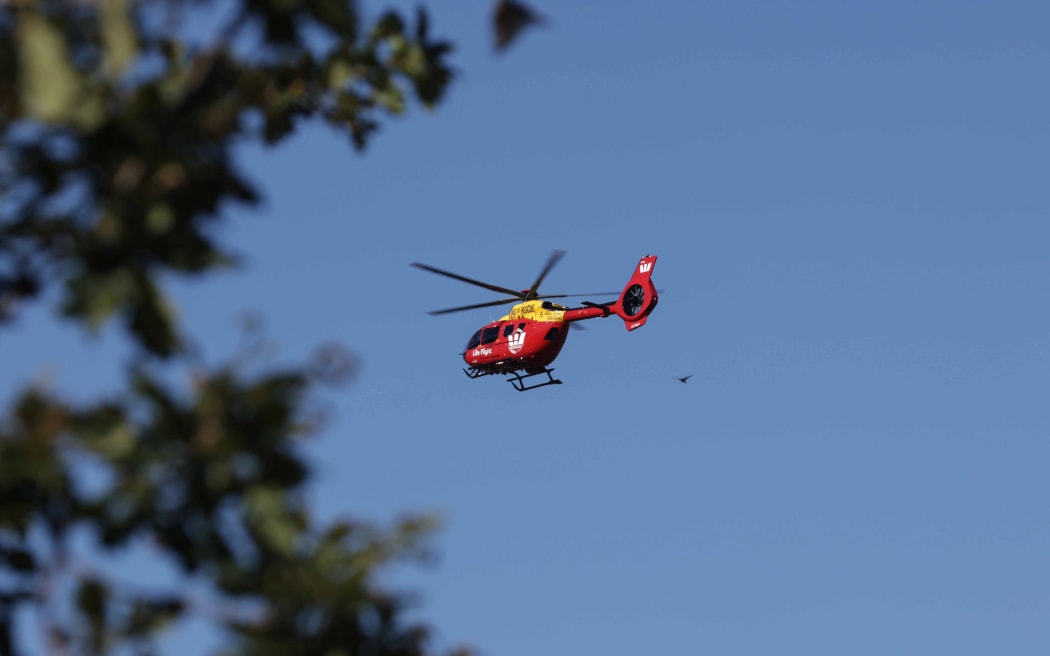 The Life Flight Westpac Rescue Helicopter being used in the search for a crashed helicopter in the  Paekākāriki Hill area on 28 January 2026.