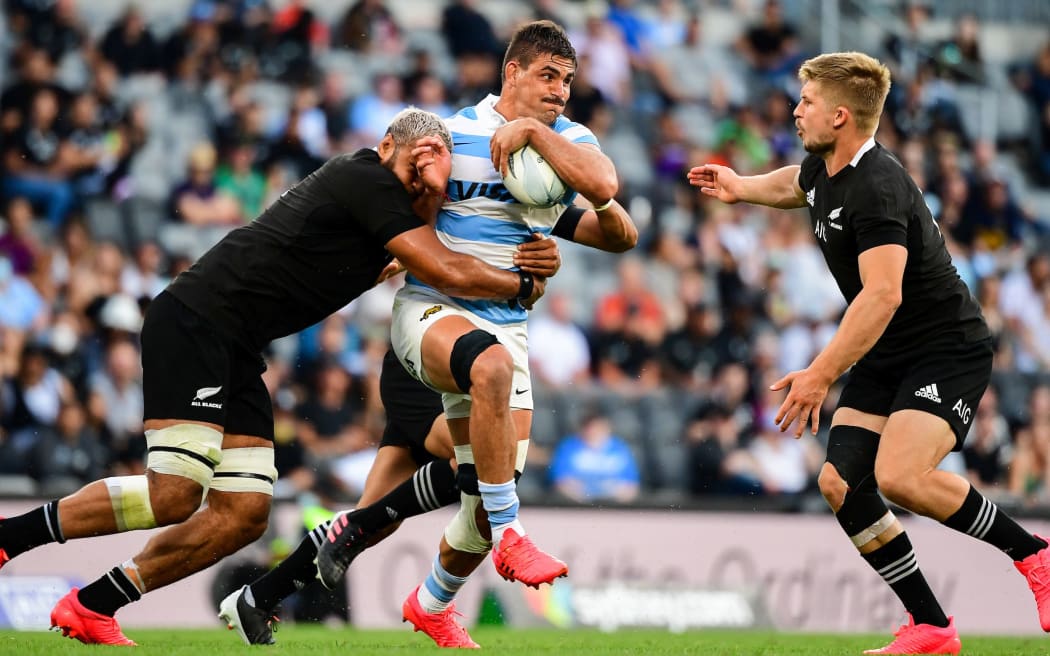 2020 Investec Tri Nations Rugby. New Zealand All Blacks v Los Pumas of Argentina at Bankwest Stadium, Sydney. Patrick Tuipulotu and Jack Goodhue of the All Blacks  tackle Argentina's Pablo Matera. Photo: Photo: Stuart Walmsley / www.photosport.nz