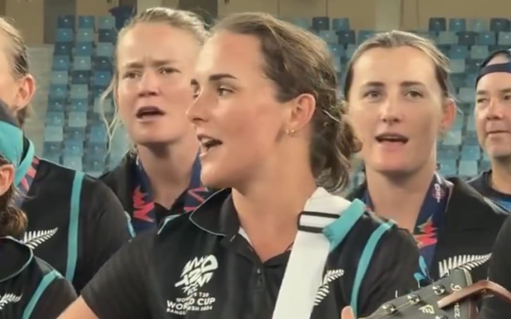 Amelia Kerr leads the White Ferns in song after history-making T20 World Cup win.