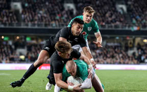 Ireland's Keith Earls scores their first try in the first Test against New Zealand.