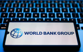 World Bank Group logo is displayed on a mobile phone screen for illustration photo. Krakow, Poland on 2 February 2023.