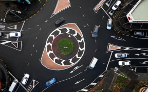 A drone shot of the Royal Oak roundabout, cars are visible entering it.