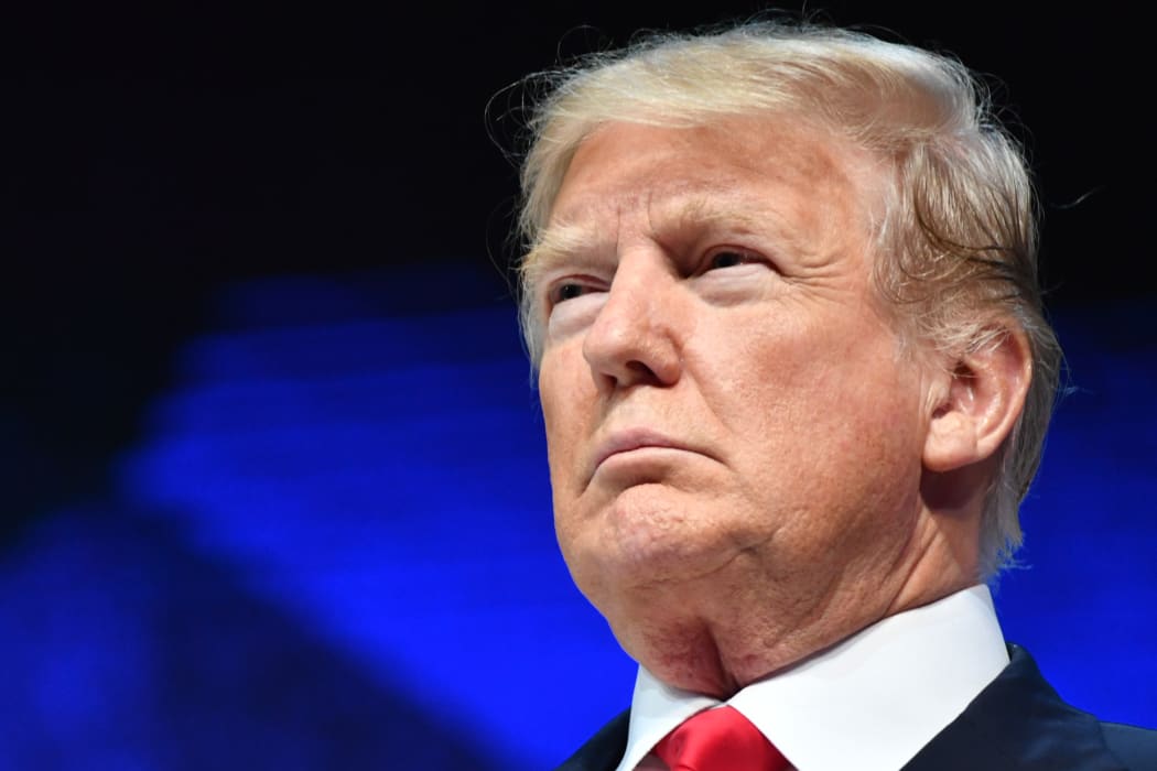 US President Donald Trump looks on before delivering a speech during the World Economic Forum (WEF) annual meeting on January 26, 2018 in Davos, eastern Switzerland.