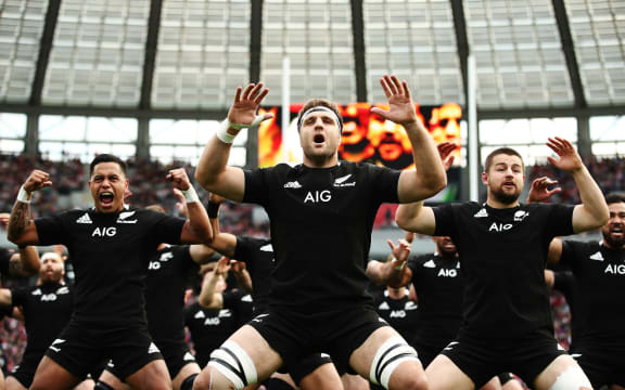 The All Blacks perform the haka ahead of the test match with Japan at Tokyo Stadium.
