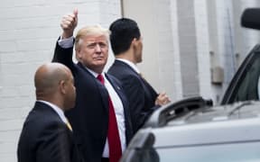 Republican US Presidential candidate Donald Trump arrives for a meeting with Speaker of the House Paul Ryan (R-WI) at the National Republican Congressional Committee May 12, 2016 in Washington, DC.