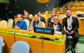 Marshall Islands Ambassador to the United Nations John Silk, seated at right with members of the Marshall Islands delegation, in the General Assembly hall in New York last October following the country's election to the UN Human Rights Council.