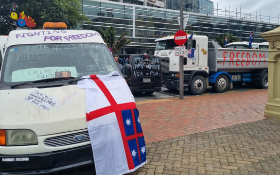 A truck and vans from the convoy covered protest messages.
