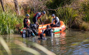 Police search the Avon River near New Brighton Road