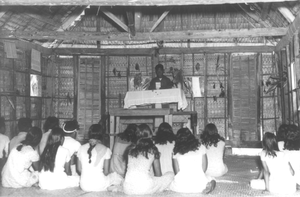The last church service on Bikini Atoll shortly before the islanders were removed by the U.S. Navy for the start of nuclear weapons testing on the atoll. Photo: US Navy.