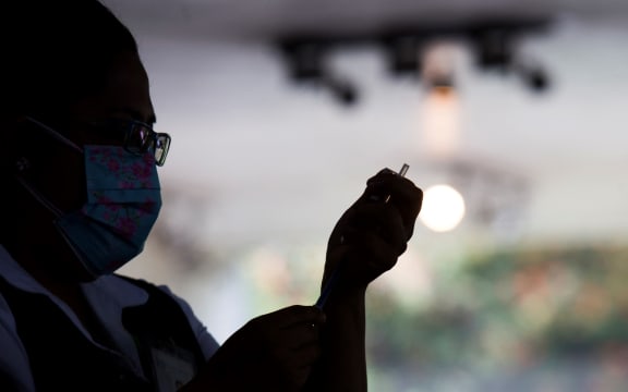 Free application, at the Vasconcelos Library, of the second dose of the Pfizer vaccine against COVID-19, for people from 40 to 49 years who live in the Miguel Hidalgo borough in Mexico City, Mexico, on July 14, 2021.