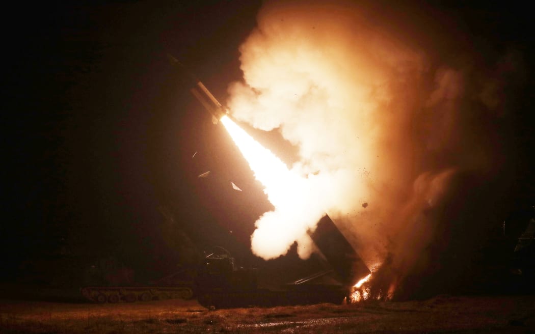 A South Korean Army Tactical Missile System (ATACMS) firing a missile from an undisclosed location on South Korea's east coast during a South Korea-US joint live-fire exercise aimed to counter North Korea’s missile test.