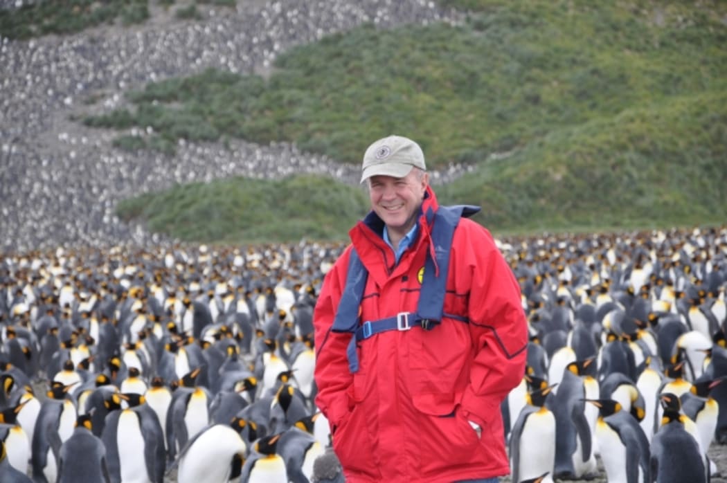 Simon Winchester with penguins