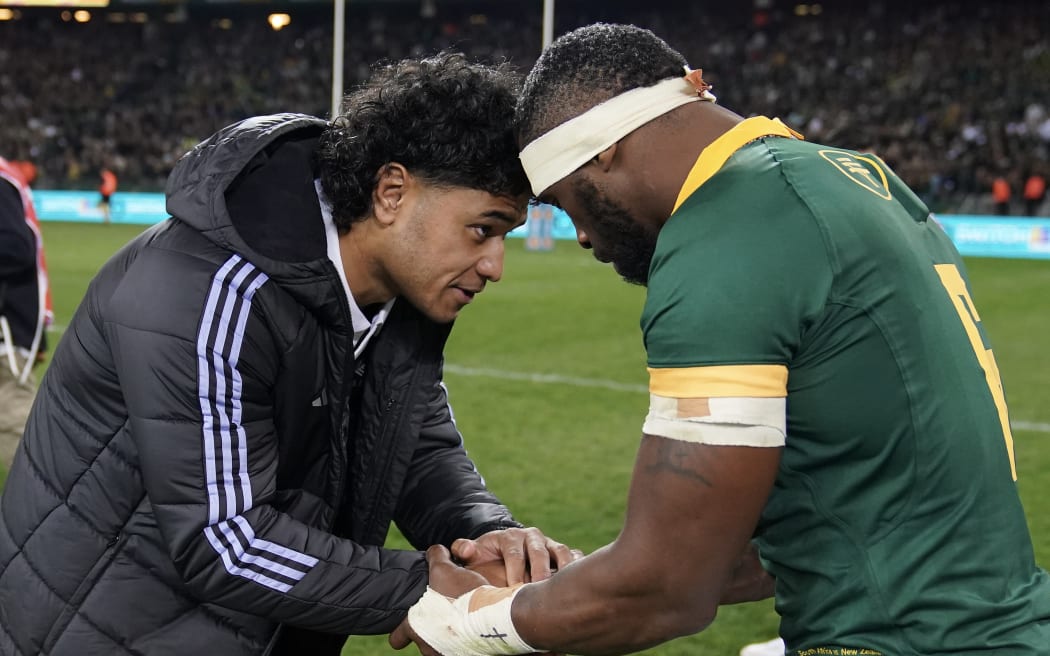 Wallace Sititi and Siya Kolisi.