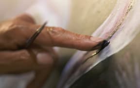 An artist who has experienced a stroke at Māpura Studio painting.