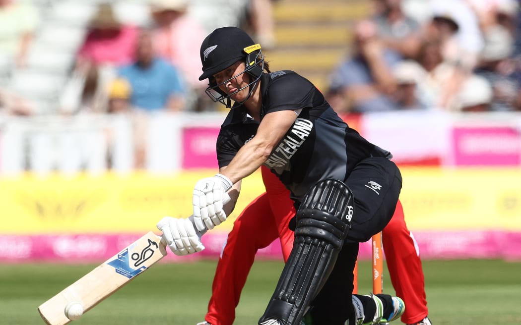 New Zealand's Sophie Devine plays a shot during the women's Twenty20 Cricket bronze medal match between New Zealand and England on day ten of the Commonwealth Games at Edgbaston in Birmingham, central England, on August 7, 2022. (Photo by Darren Staples / AFP)