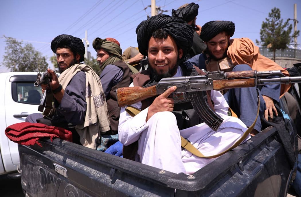 Taliban members set checkpoints around Hamid Karzai International Airport in Afghan capital Kabul on 2 September 2021.