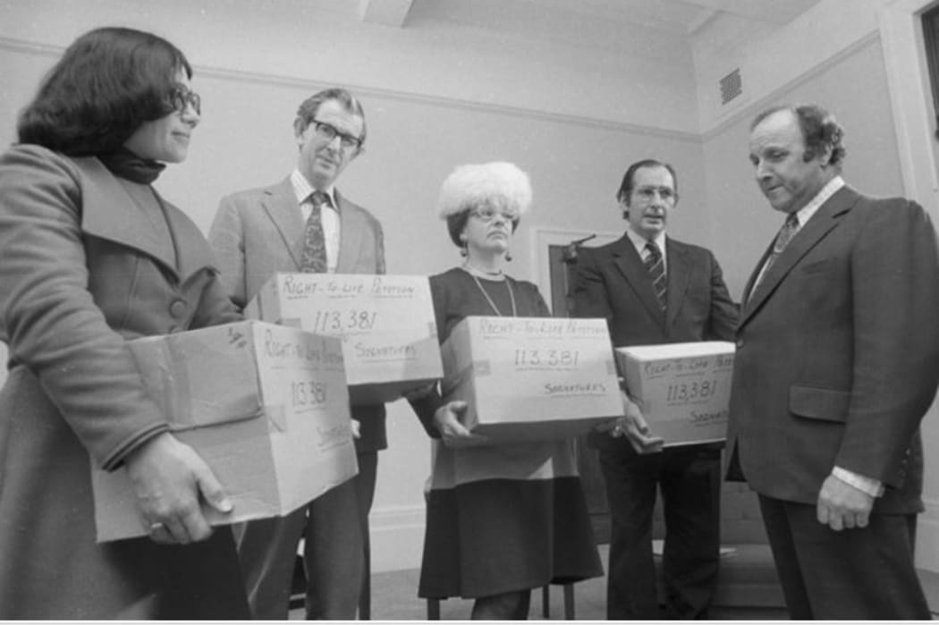 Members of the Society for the Protection of the Unborn Child at parliament with a petition. in 1975. From left to right: Marilyn Pryor, Dr Jack Bergin, Dr Diana Mason (national president) and Des Dalgety.