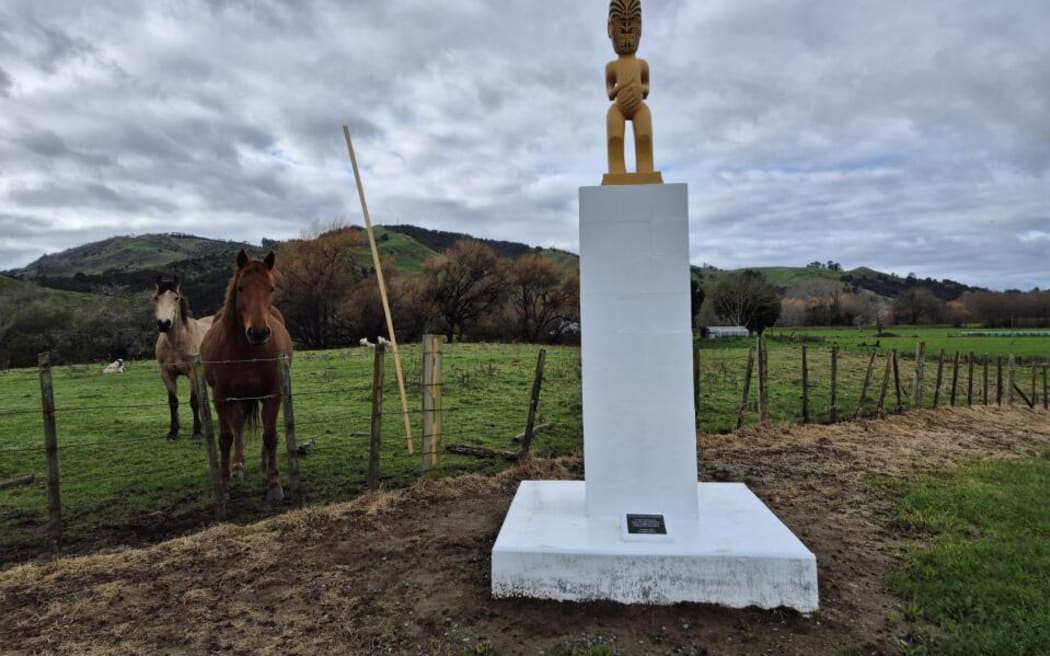 A pou whenua overlooks Rangatira Marae's new site which is just minutes away from the original location, but on much higher ground.