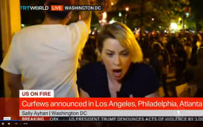 Sally Ayhan from Turkish broadcaster TRT World hit with rubber bullets.