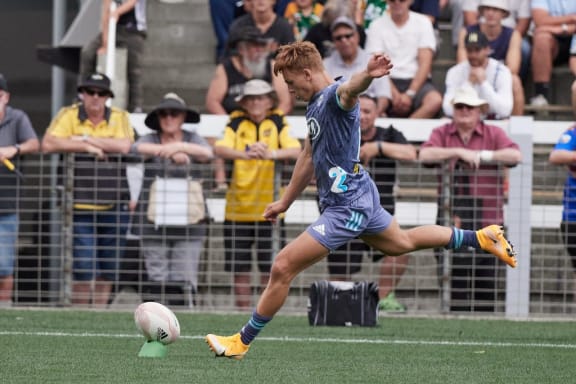 Ruben Love taking a conversion at the Game of Three Halves.