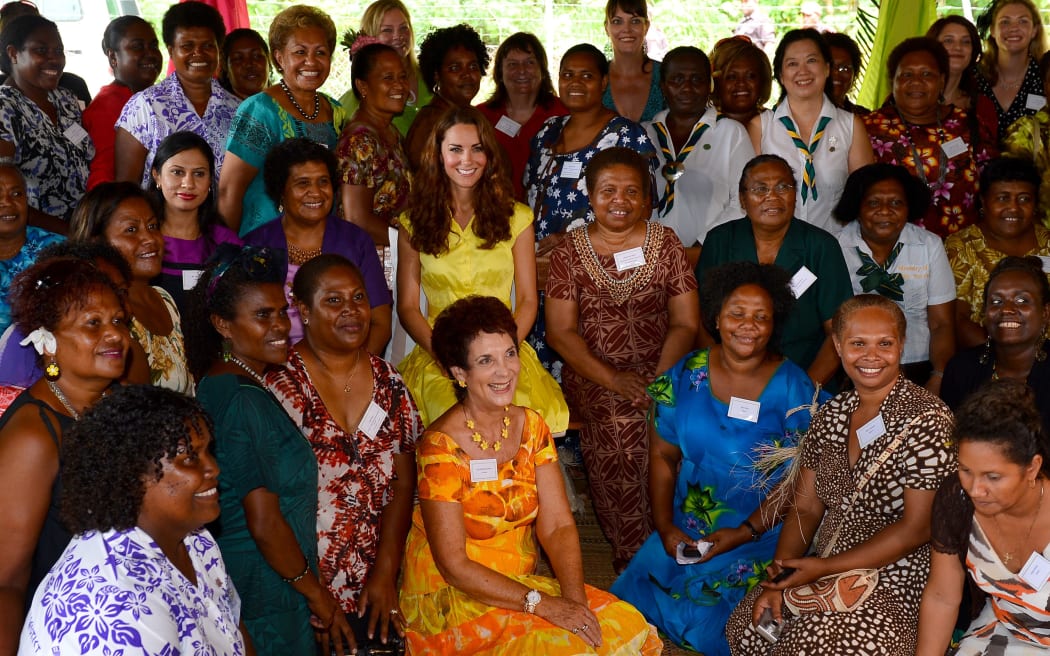 The Duchess of Cambridge poses with women from NGOs in Solomon Islands.