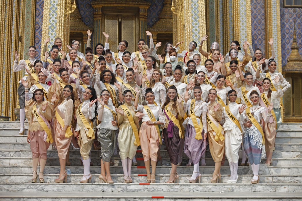 Contestants in the Miss Grand International 2020 pageant wearing traditional Thai costumes at the Temple of the Emerald Buddha on 17 March 2021. Contestants from 63 countries took part.